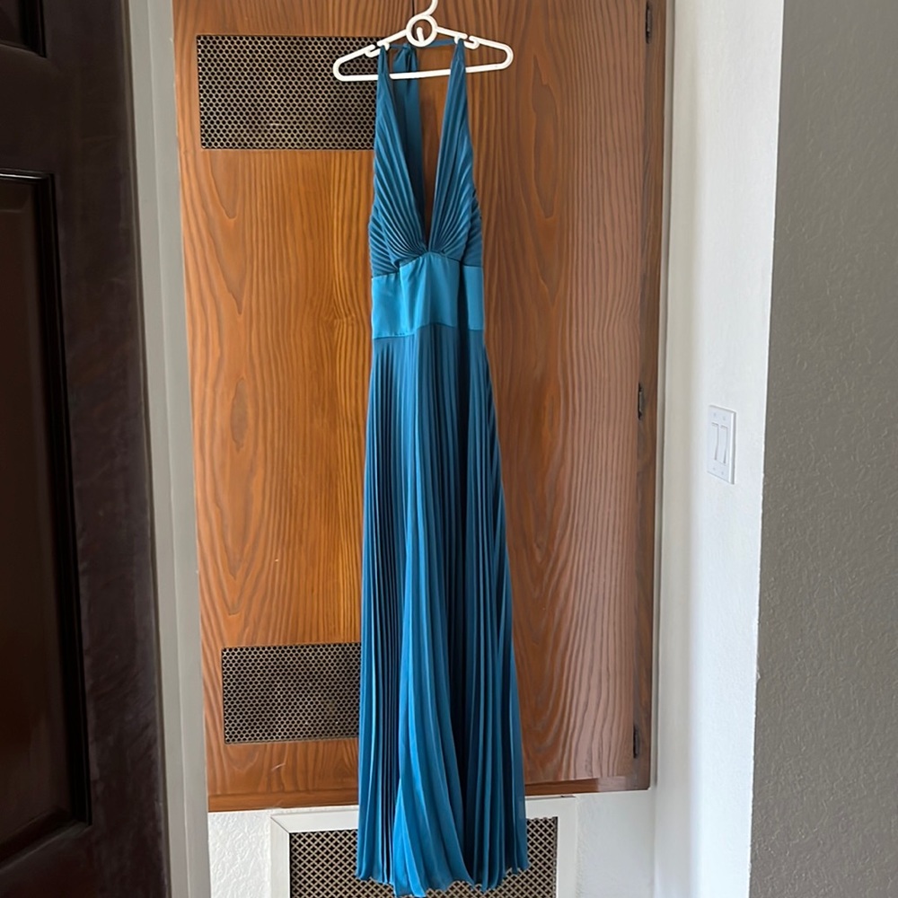 Stunning long halter ABS dress.